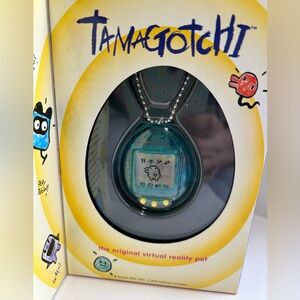 Original 1997 #1800 Bandai Tamagotchi Clear blue virtual reality pet